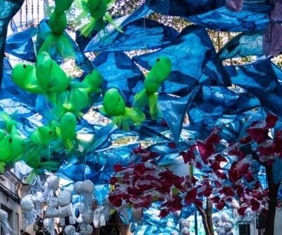 Decorated street at the Festa Major of the Gràcia neighborhood. Credit: Dbascones. Wikimedia Commons. Licensed under CC BY-SA 4.0.