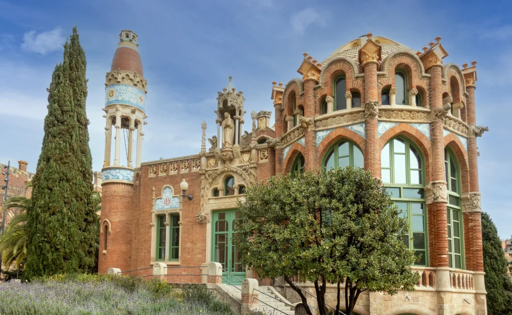 Beneath the Barcelona sky, the historic Hospital de la Santa Creu stands as a testament to Catalan Gothic grandeur and centuries of healing
