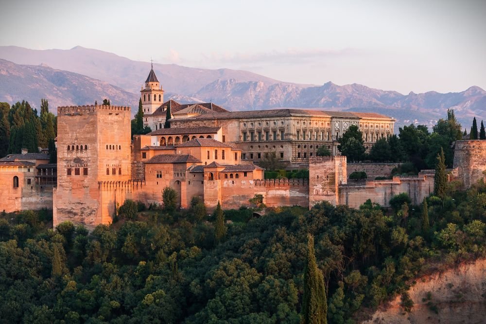Dawn at the Palace of Charles V, Alhambra, Granada, Spain [Edited Photograph]. Credit: Jebulon. Released under CC0 1.0 Universal Public Domain Dedication. 