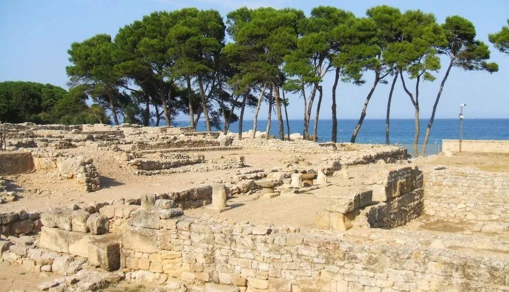 The serene remnants of the Serapeion at EmpÃºries, where ancient Greek and Roman spirits echo amidst the Catalan breeze.
