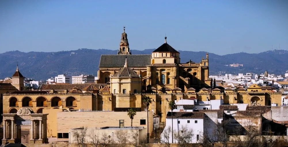 Córdoba's Majestic Mezquita: A Timeless Silhouette Against the Spanish Sky