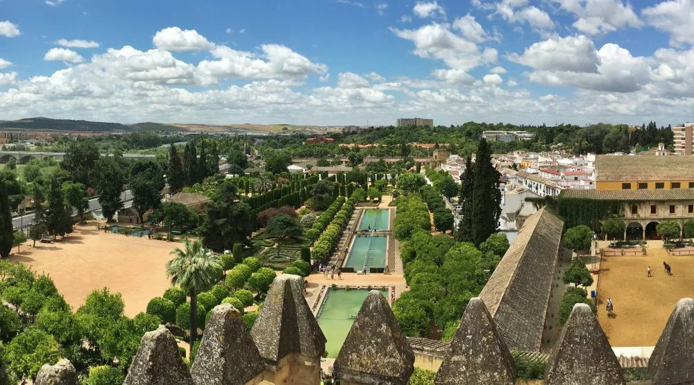 Gardens of the Alcázar of the Christian Monarchs, Córdoba, Spain [Edited Photograph]. Credit: Eric Titcombe. Licensed under CC BY 2.0. 