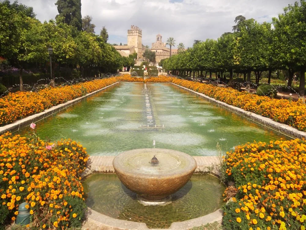 Gardens and Palace of the Alcázar of the Christian Monarchs, Córdoba, Spain [Edited Photograph]. Credit: La Rossa. Licensed under CC BY-SA 3.0.