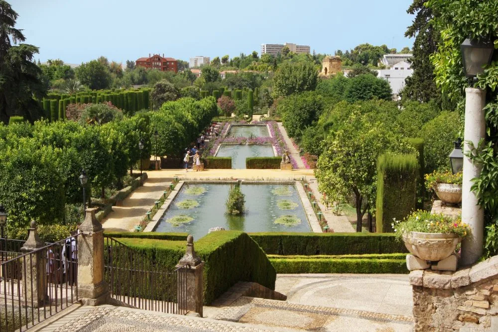 Partial View of the Gardens, Alcázar of the Christian Monarchs, Córdoba, Spain [Edited Photograph]. Credit: Jebulon. Released into the public domain. 