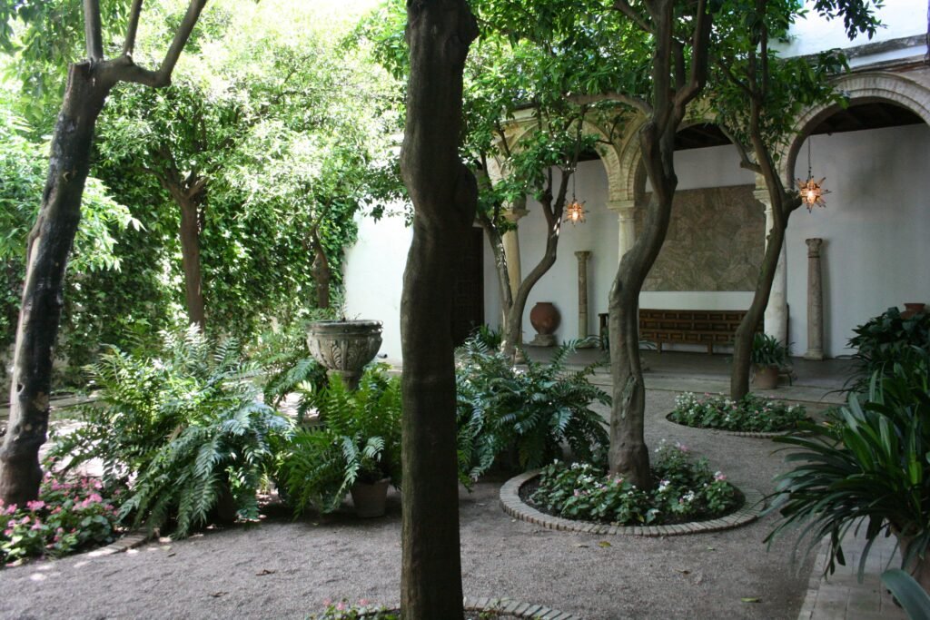 Chapel’s Courtyard, Viana Palace, Córdoba (Spain) [Edited Photograph]. Credit: Michel wal. Licensed under CC BY-SA 3.0. 