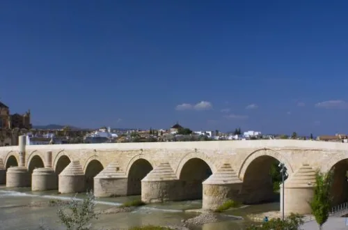 CÃ³rdoba's Timeless Bridge: Spanning the Guadalquivir River, the Roman Bridge connects the Campo de la Verdad with the Cathedral Quarter, standing as the city's sole bridge for two millennia until the mid-20th century.