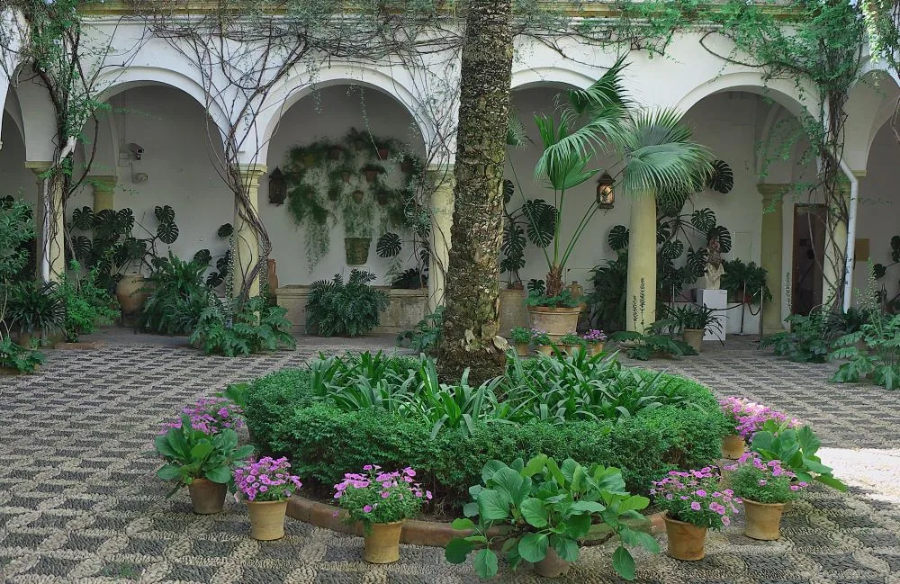 The Palacio de Viana in Córdoba: A noble canvas where history paints its legacy within lush patios and stately rooms, whispering tales of Spanish aristocracy.