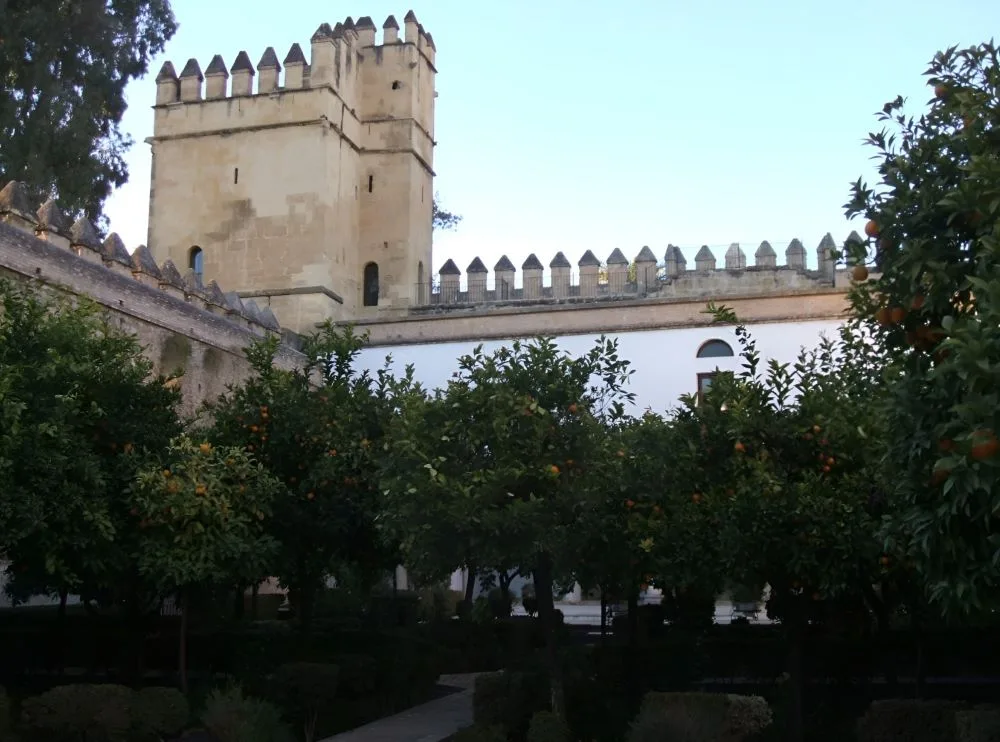 The Alcázar de los Reyes Cristianos in Córdoba: A fortress of history where the echoes of Spain's past kings and queens resonate amidst serene gardens and robust stone walls.