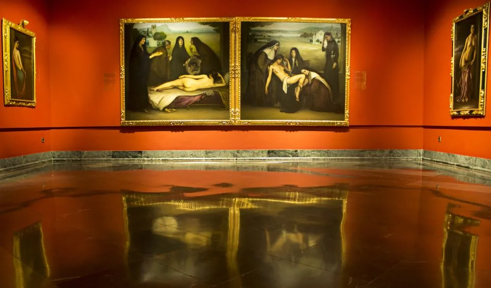 Paintings by Julio Romero de Torres on exhibit at his namesake museum in Córdoba, Spain, capturing the essence of Spanish romantic symbolism. 
