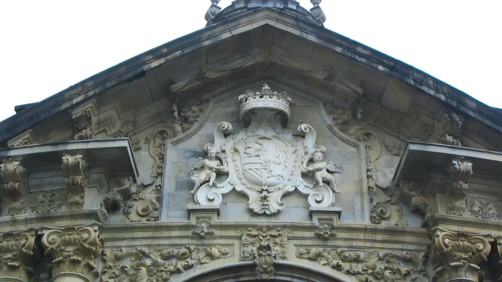 Santuario de Loyola. Entrance, shield above the entrance (2007) photograph. Entrance to the Basilica, Sanctuary of Loyola, Azpeitia, Gipuzkoa, Basque Country, Spain