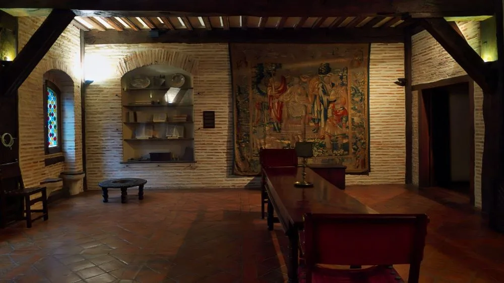 Entrance hall and main office. A providential event (2013) photograph. The event in which Magdalena de Araoz, Ignatius' sister-in-law, providentially provides him with the books "Life of Christ" and "Legend of the Saints", beginning his conversion process.