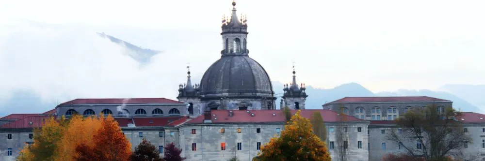 Exterior view of the Sanctuary of San Ignacio de Loyola in Azpeitia, Gipuzkoa, showcasing its baroque architecture and central dome.