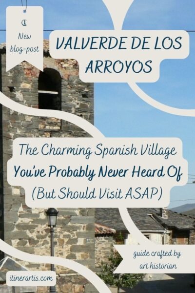 Scenic view of Valverde de los Arroyos, Spain, showcasing its traditional black slate architecture, cobbled streets, and mountain backdrop. A hidden gem in Guadalajara’s Sierra Norte.