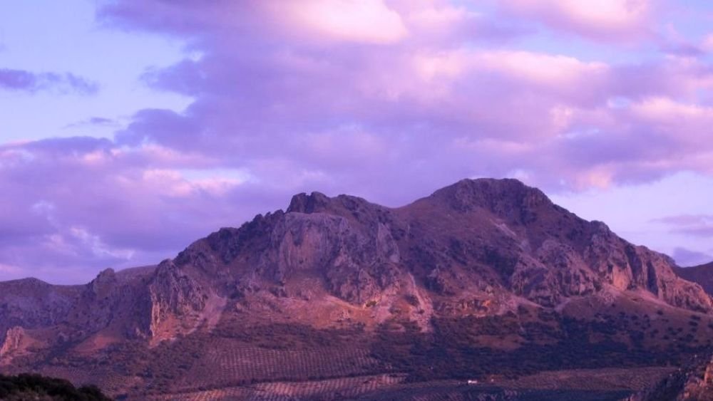 Sierras de Carcabuey, Sierras Subbéticas Natural Park, Córdoba, Spain [Edited Photograph]. Credit: Teckömo. Licensed under CC BY-SA 3.0